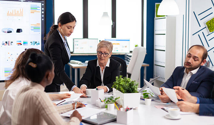 Compliance training meeting in a business office